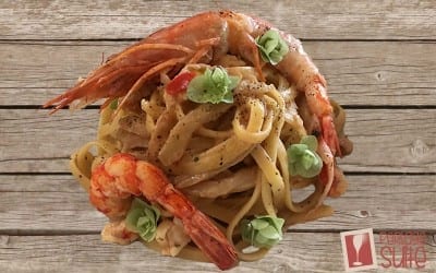 Recipe of linguine with prawns, aubergines and oregano flowers paired with Stefano Cola's Franciacorta DOCG